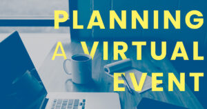 table with laptop and notepad with the words "Planning a Virtual Meeting"