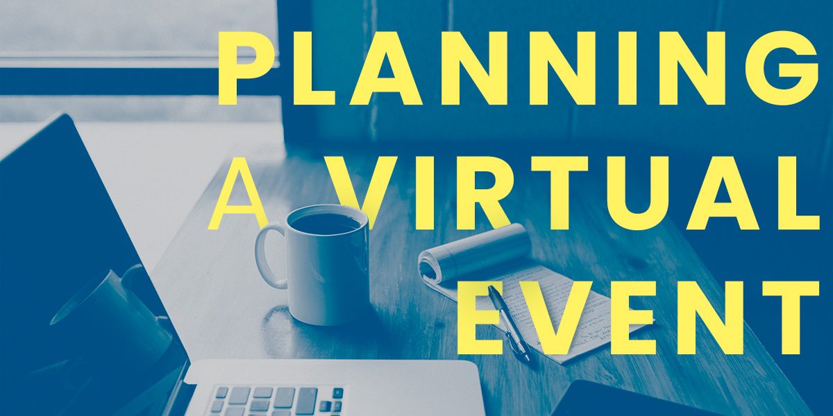 table with laptop and notepad with the words "Planning a Virtual Meeting"